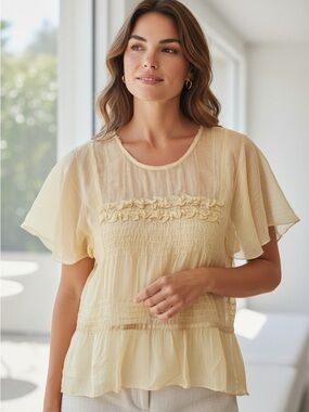 Anthropologie brand Saja Silk Blouse in Soft Yellow with soft silk Trim